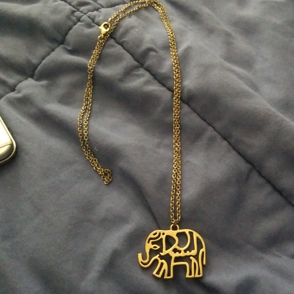 Gold colored elephant necklace